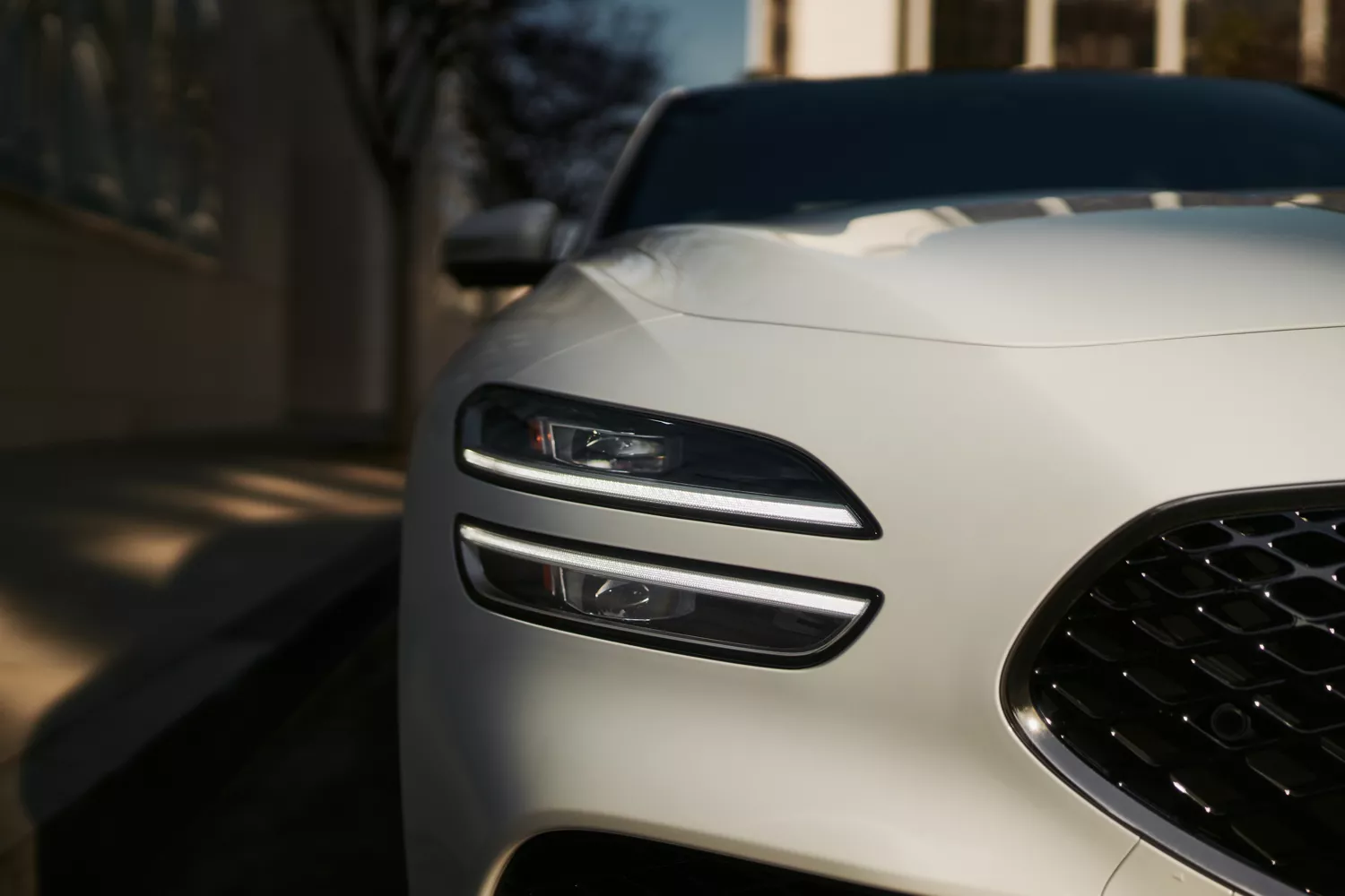 "Design Details" component with close up of  Alta White Genesis G70 headlamp below
