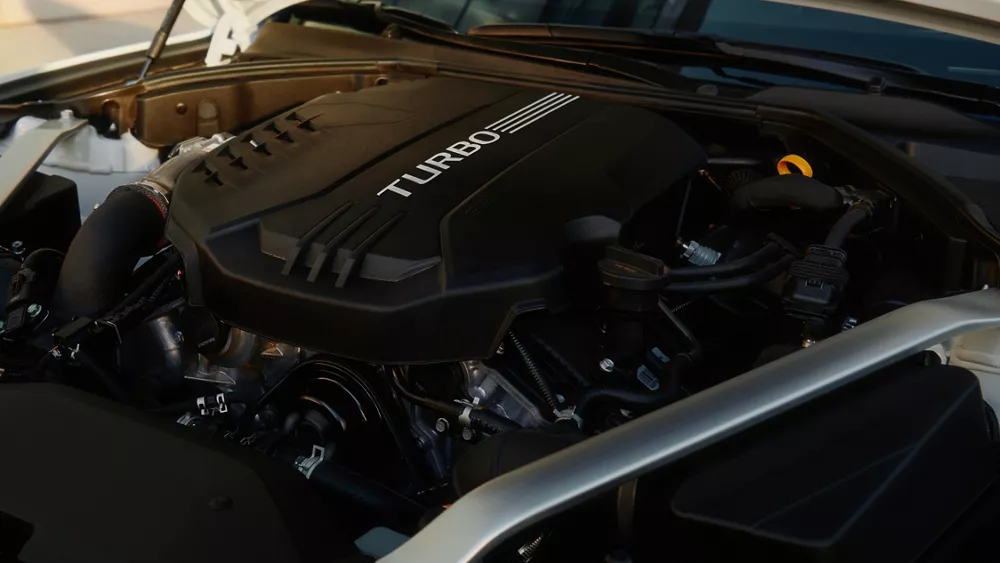 Close-up of Genesis 2.5-liter inline 4 cylinder turbo engine