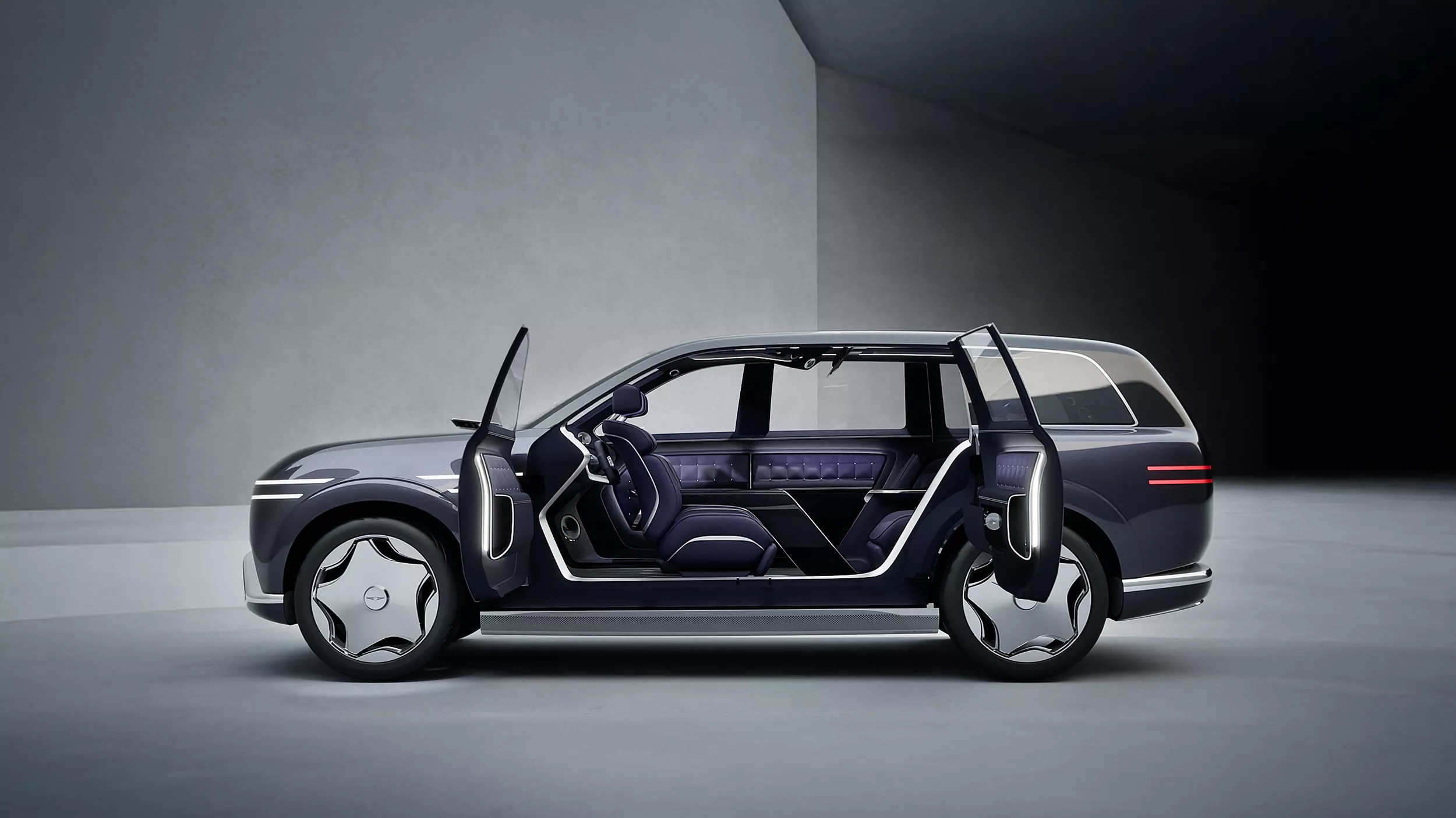 Side profile of Genesis Neolun Concept vehicle with open coach doors revealing interior design