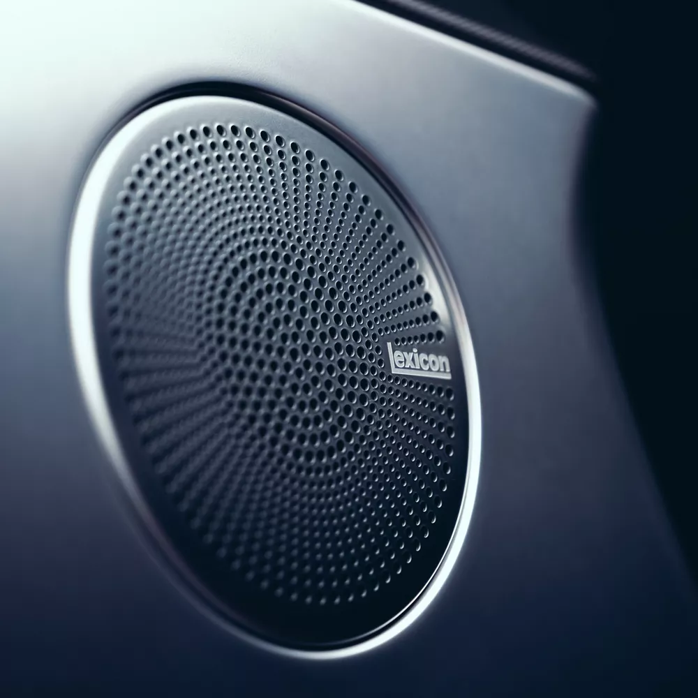Interior close up of Lexicon premium audio speaker on door panel inside 2027 Genesis G70