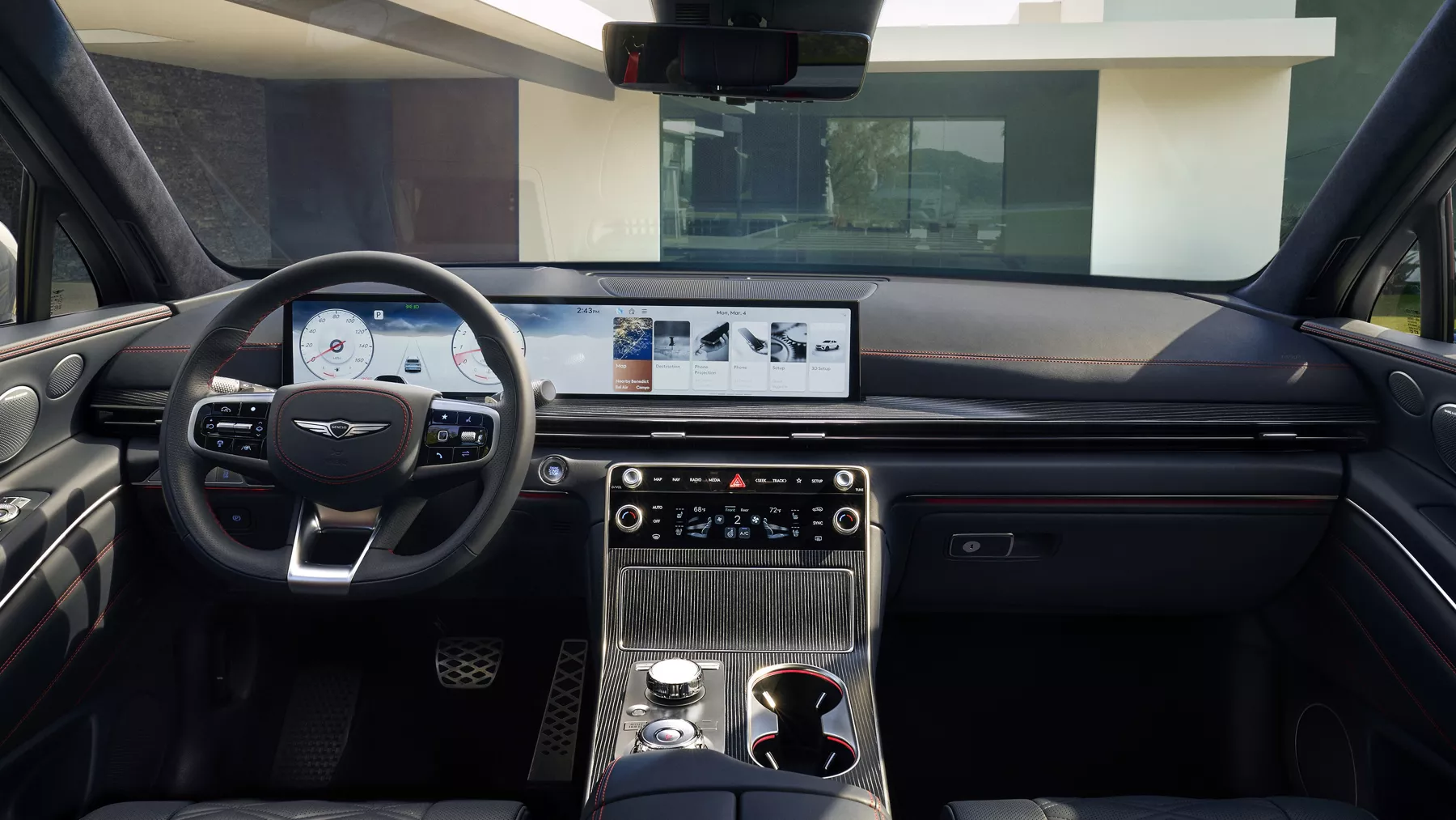 Interior backseat POV of front seat inside Genesis GV80 Coupe, parked outside modern house