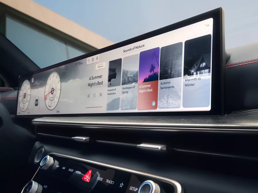 Interior close up of 27” OLED Cluster and Navigation Integrated display in the Genesis GV80 Coupe