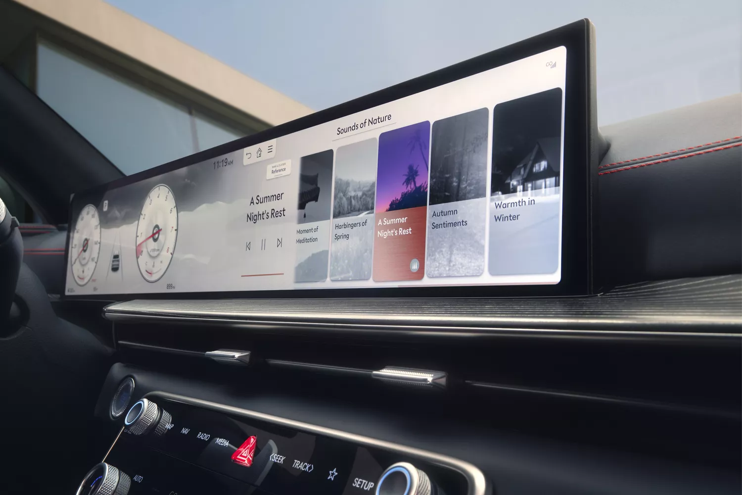 Low angled interior view of 27” OLED navigation display inside Genesis GV80 Coupe