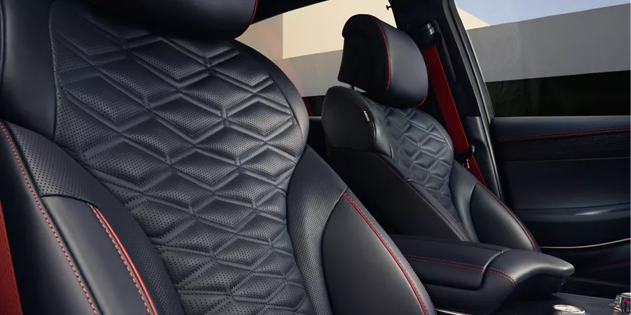 Interior passenger side view of Nappa leather seats in Ultramarine Blue inside Genesis GV80 Coupe