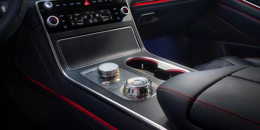 Interior close up of center console in Ultramarine Blue Nappa leather inside Genesis GV80 Coupe