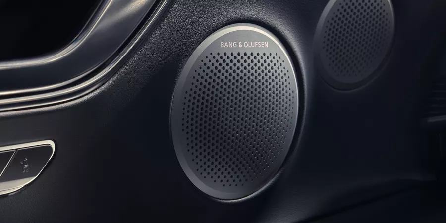 Interior closeup in-door Bang & Olufsen speaker inside Genesis GV80 Coupe
