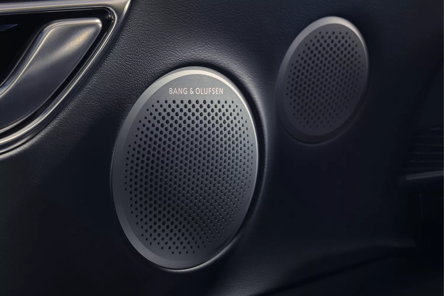 Interior closeup in-door Bang & Olufsen speaker inside Genesis GV80 Coupe