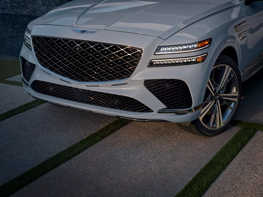 3/4 front driver side close up of Genesis GV80 Coupe in Bering Blue