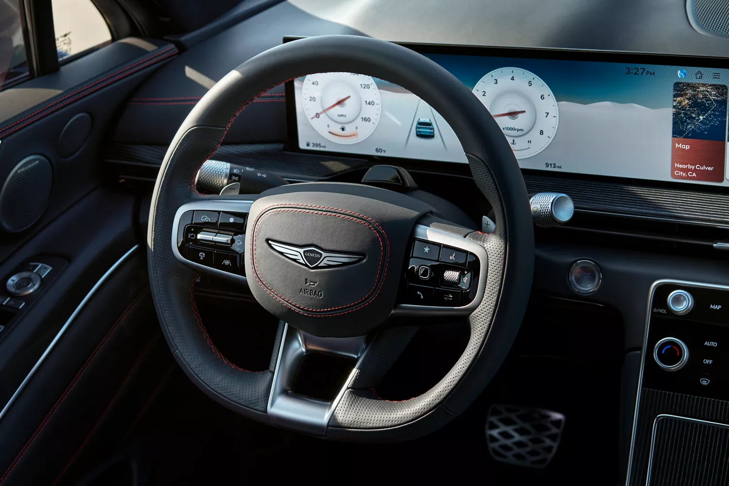 Interior close up D-Cut steering wheel inside the Genesis GV80 Coupe