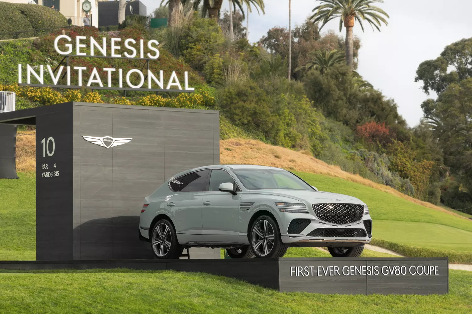 Gray Genesis GV80 Coupe on display at the Genesis Invitational golf tournament in Los Angeles, CA.