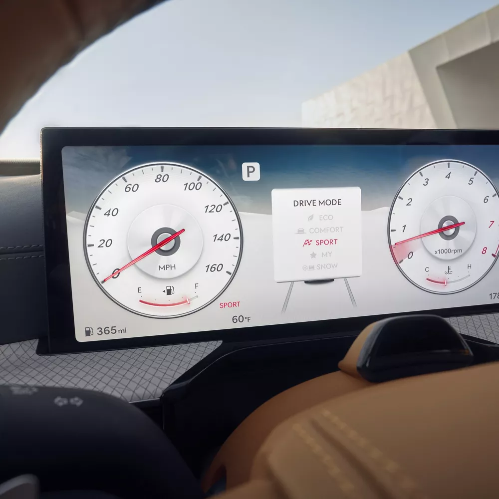 Interior closeup of infotainment screen with Driver Mode set to "Sport", inside Genesis GV80