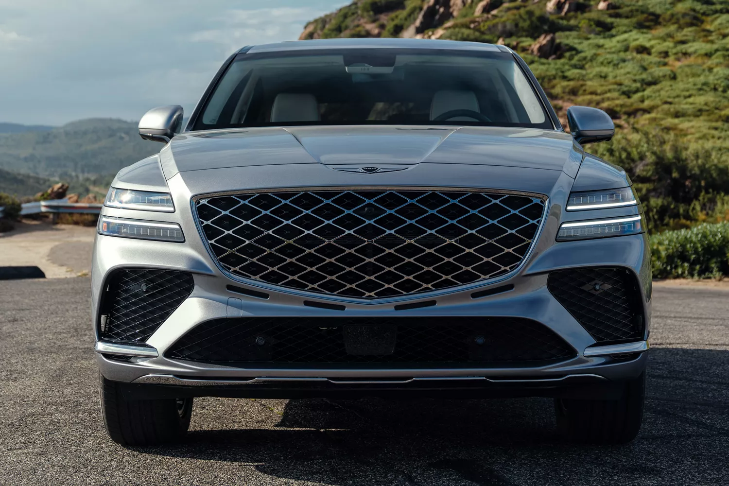Front closeup view of Genesis GV80 Coupe parked outside