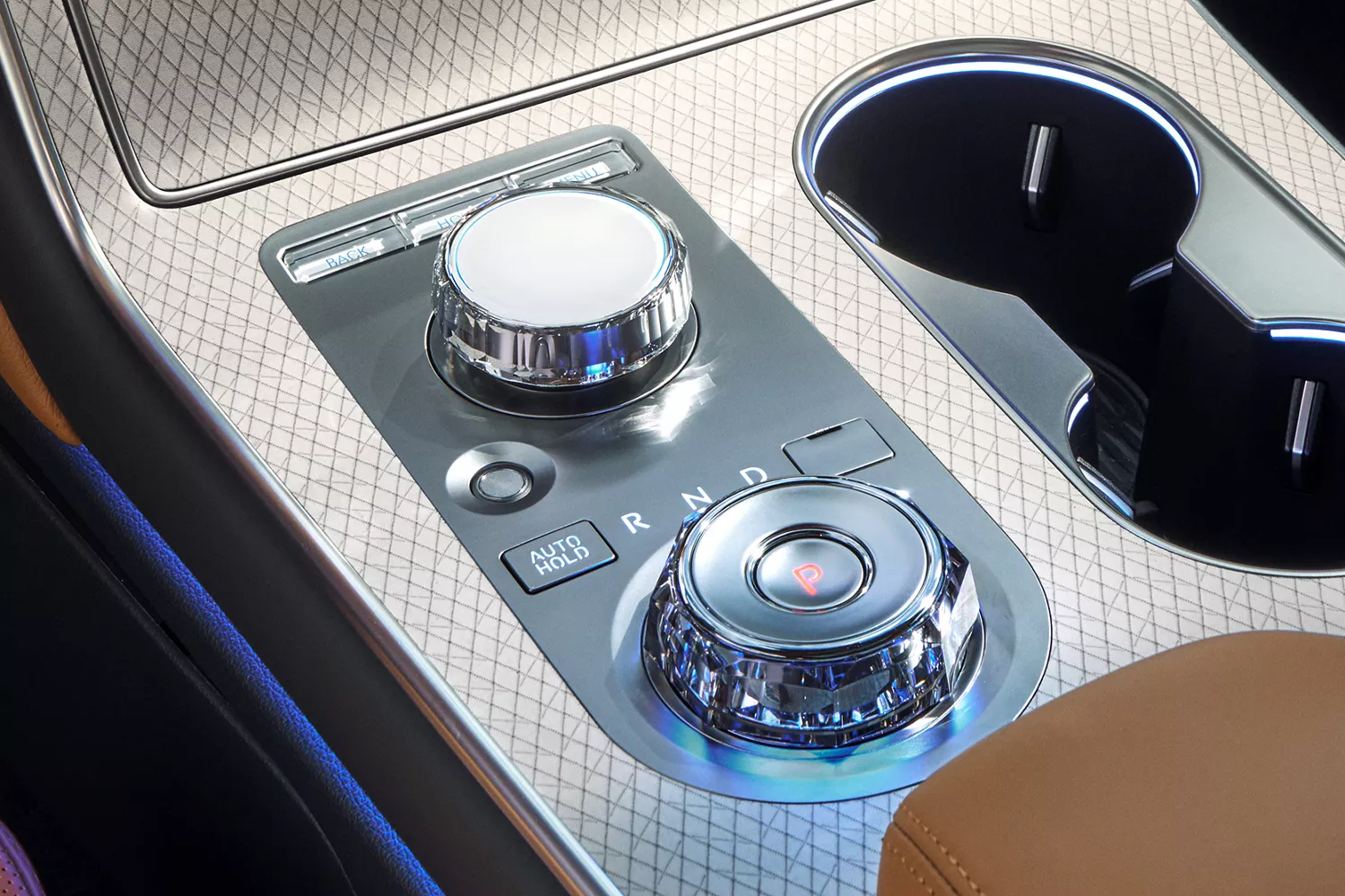 Interior closeup of center console details inside Genesis GV80