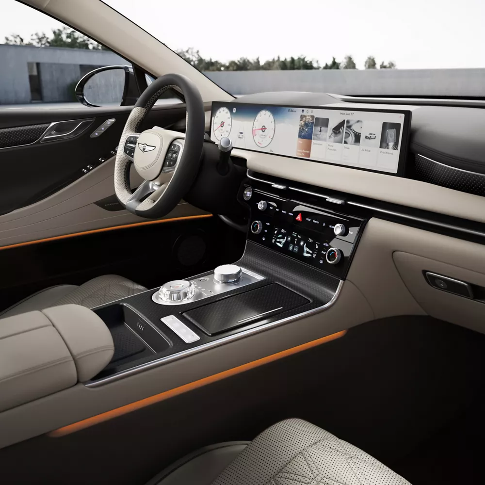Front passenger pov of Genesis G80 interior in beige leather