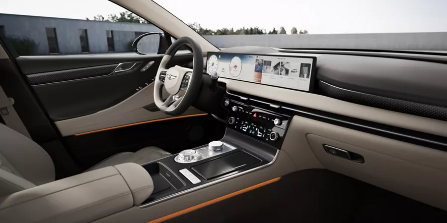 Front passenger pov of Genesis G80 interior in beige leather