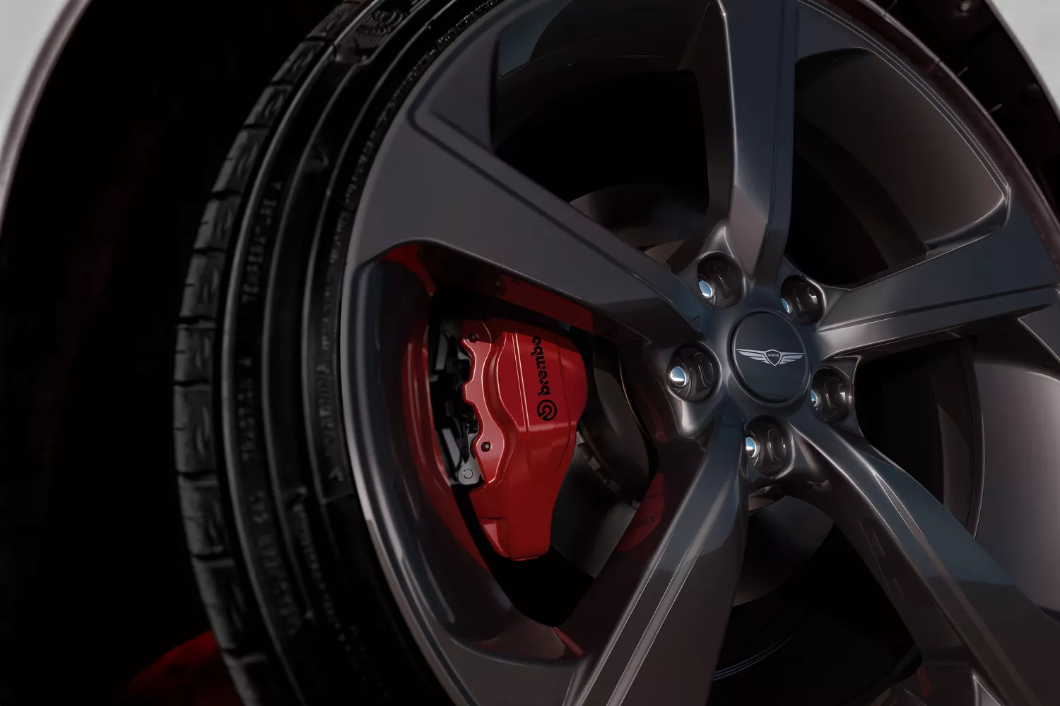 "Brakes" tab selected with close up of wheel detail and red brake caliper on Genesis G70