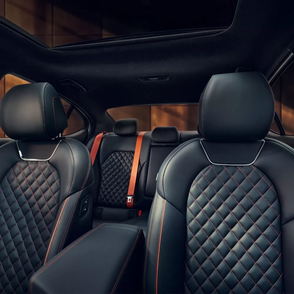Interior view of quilted Nappa leather seating inside 2027 Genesis G70 Prestige Graphite