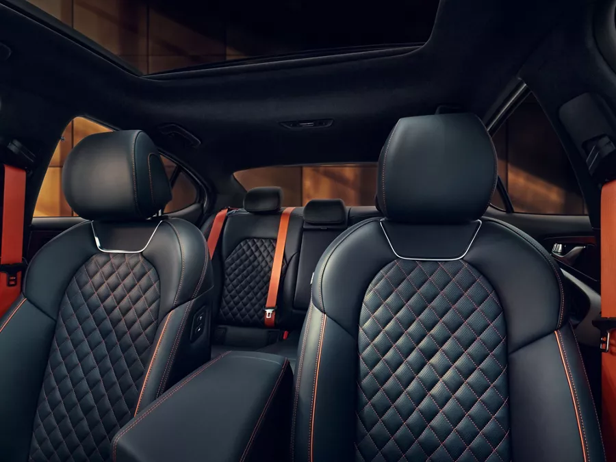 Interior view of quilted Nappa leather seating inside 2027 Genesis G70 Prestige Graphite