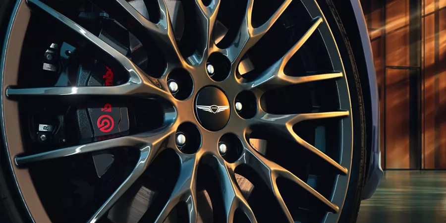 Close up of wheel and brake caliper details on 2027 Genesis G70 Prestige Graphite
