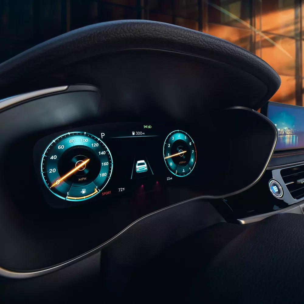 Interior view of digital gauge clusters inside 2027 Genesis G70 Prestige Graphite