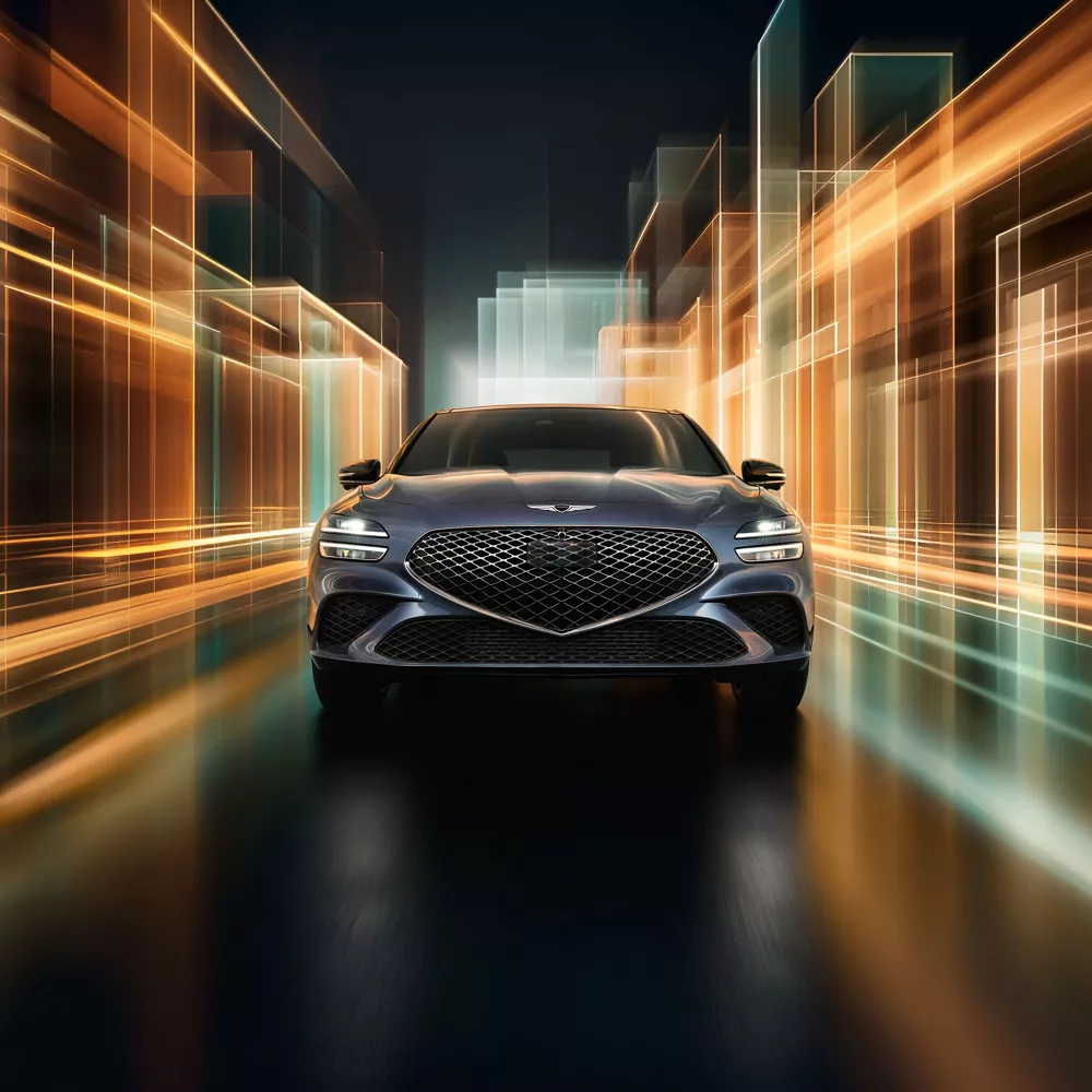 Front view of 2026 Genesis G70 3.3T Prestige AWD in Ceres Blue, in colorful digital environment