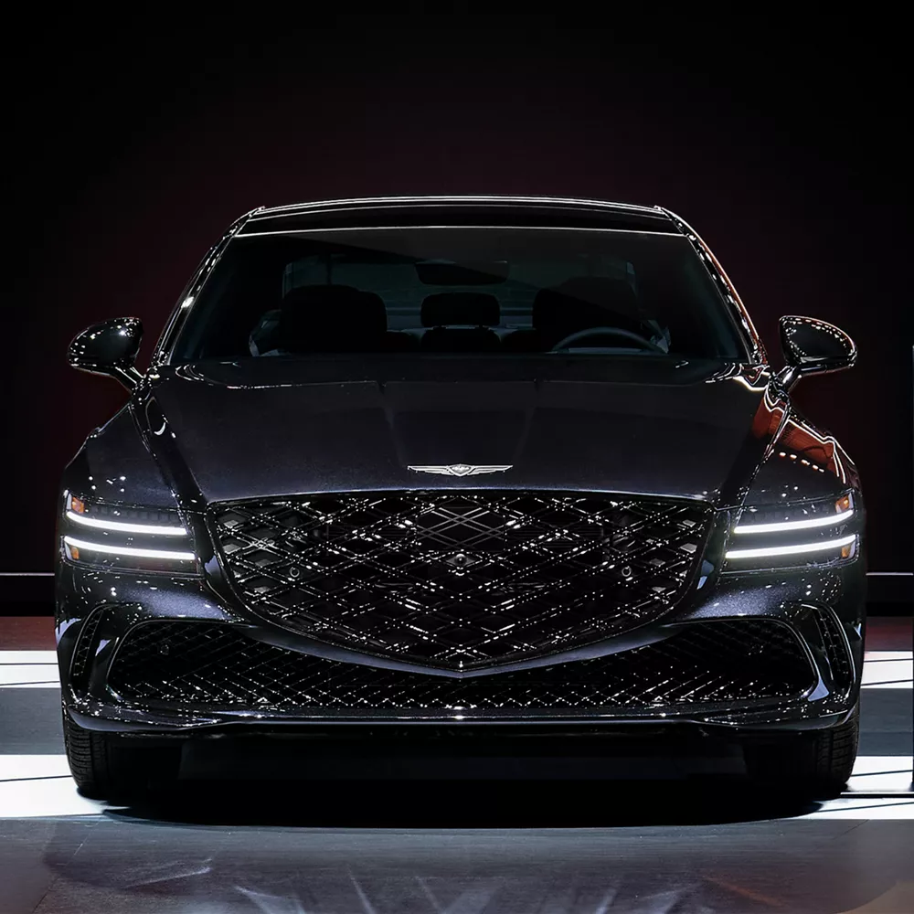 The Genesis Lounge at the 2025 LA Auto Show with Genesis vehicles on display