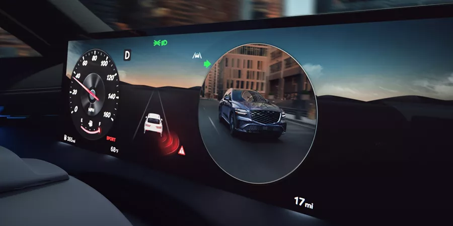 Close-up of 2026 Genesis GV70 27inch OLED display; rear-view camera, speedometer, blind spot monitor