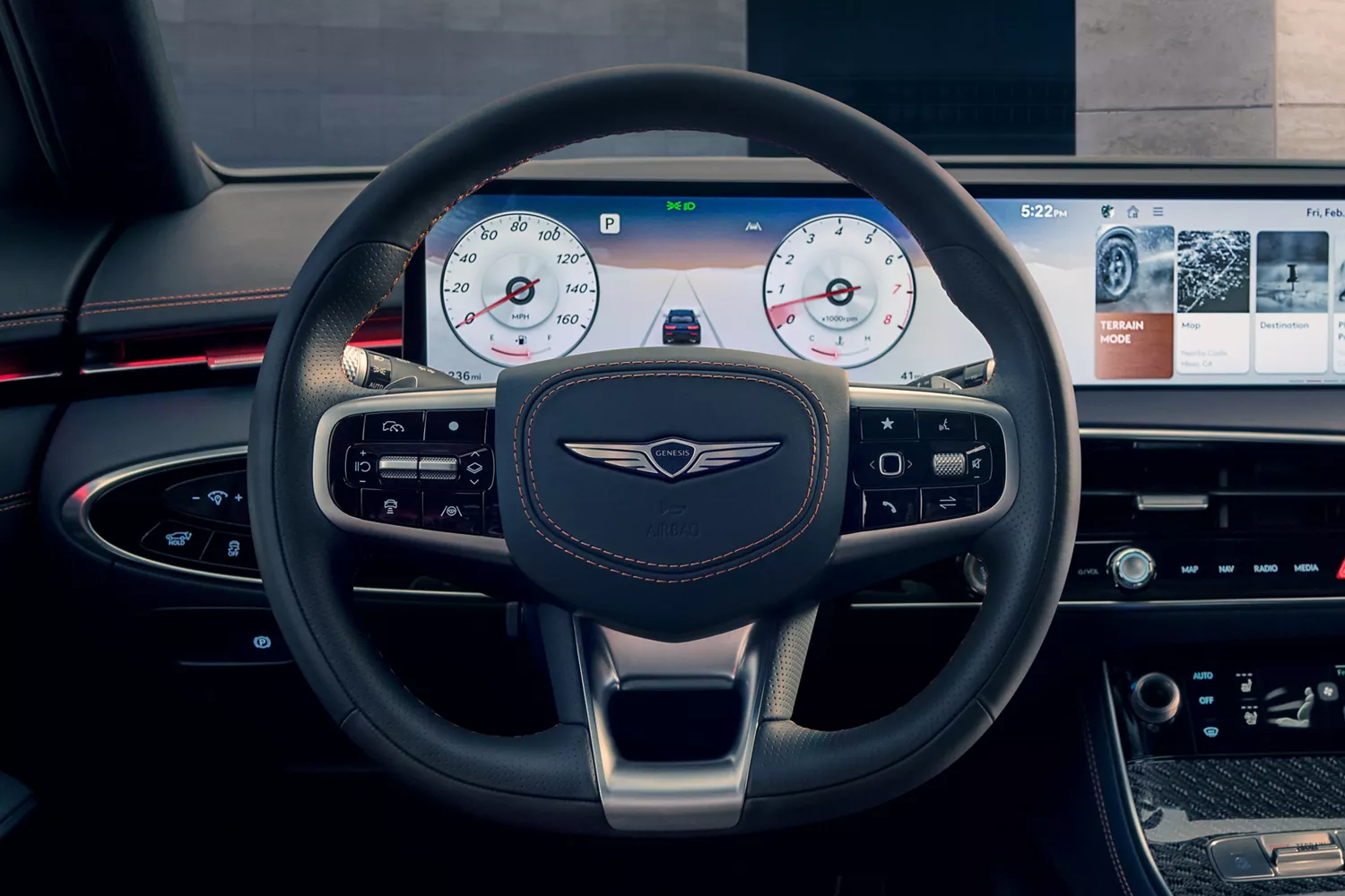 Interior driver seat pov close-up of 2026 Genesis GV70 D-cut steering wheel and digital dashboard