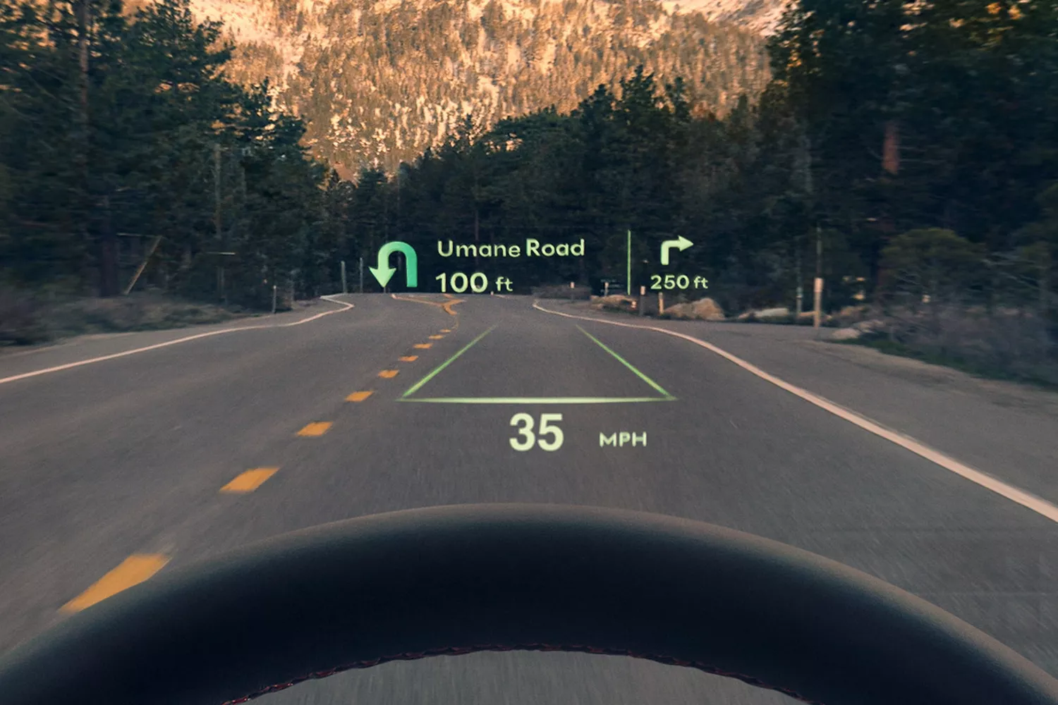 Driver POV of 2026 Genesis GV70 head-up display showing turn-by-turn navigation and speed details