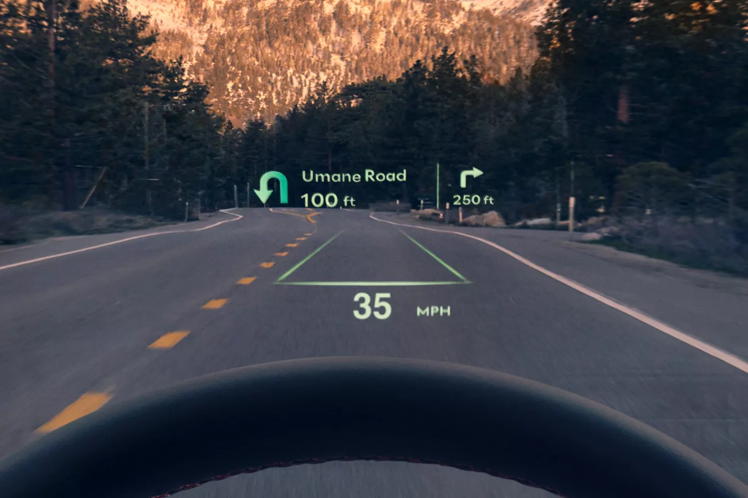 Interior HUD navigation POV on forest road from driver seat inside Genesis Electrified GV70
