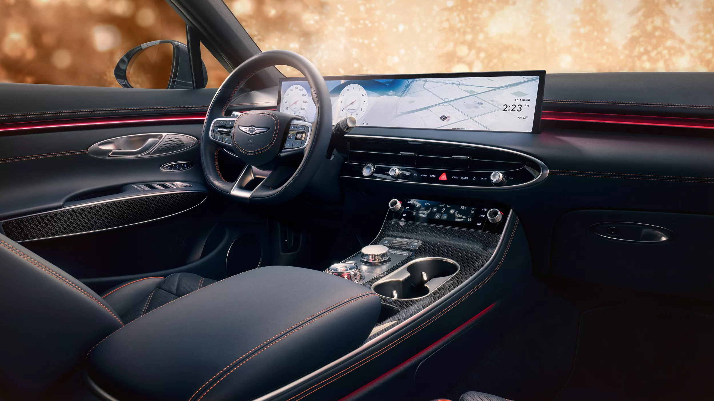 Front passenger pov of steering wheel & LED display in Genesis GV70 with black leather interior