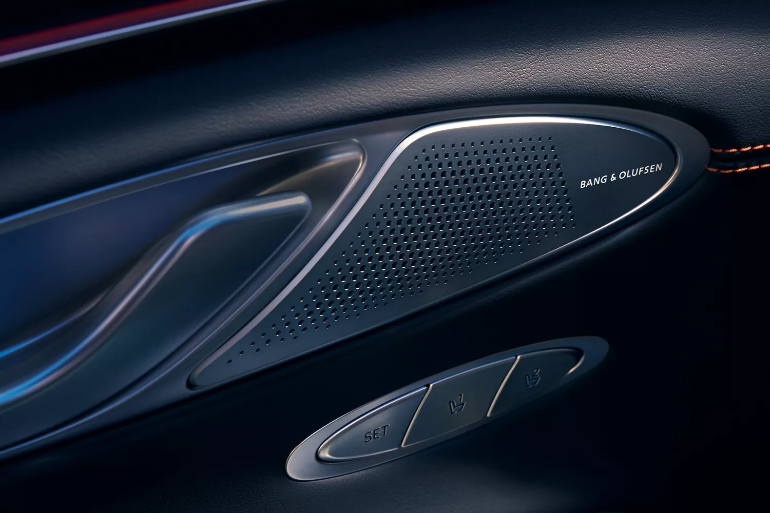 Interior Close up of 2026 Genesis GV70 driver-side door panel showing Bang & Olufsen speaker