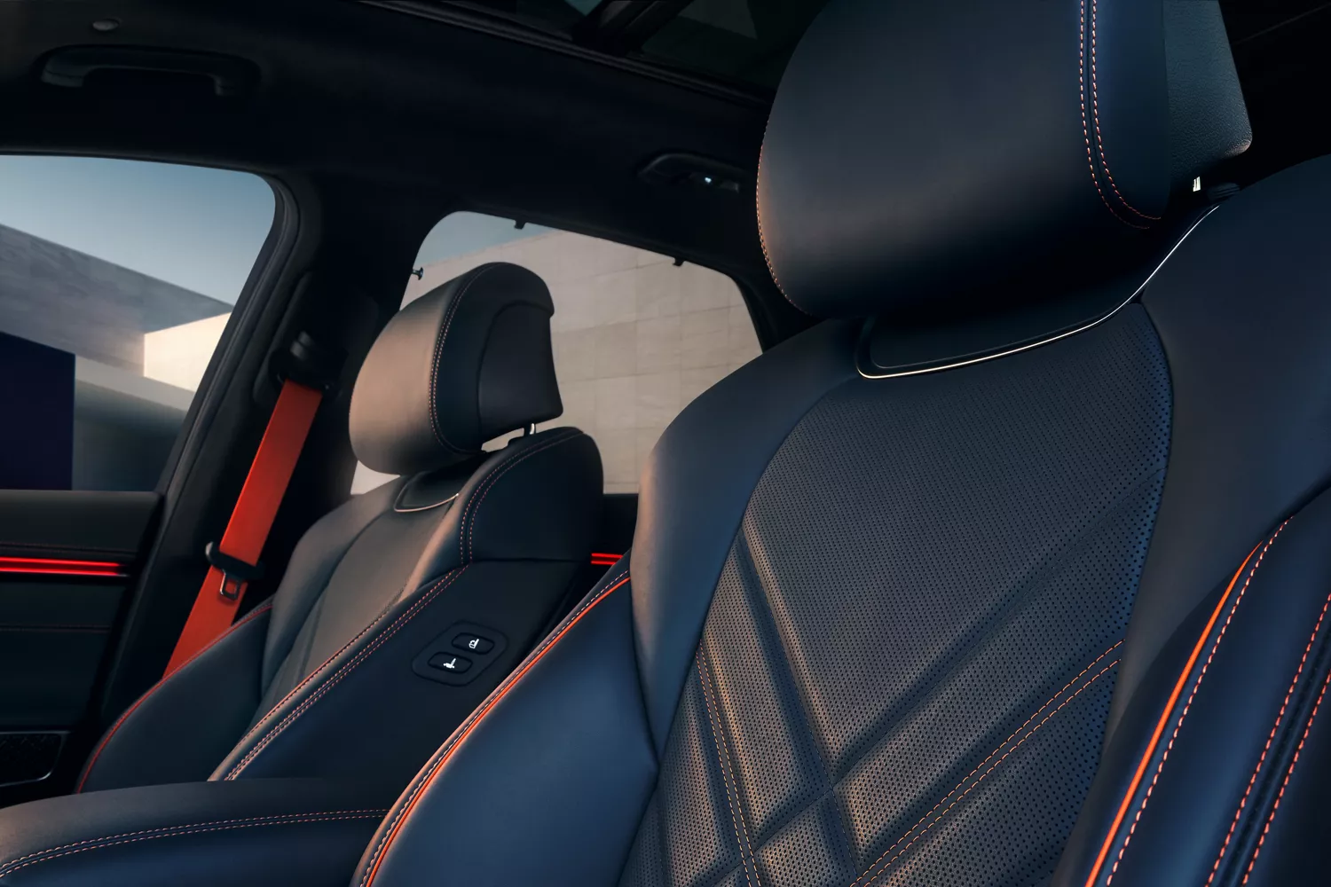 Genesis GV70 interior close-up of UltraMarine Blue orange stitched quilted Nappa leather front seats
