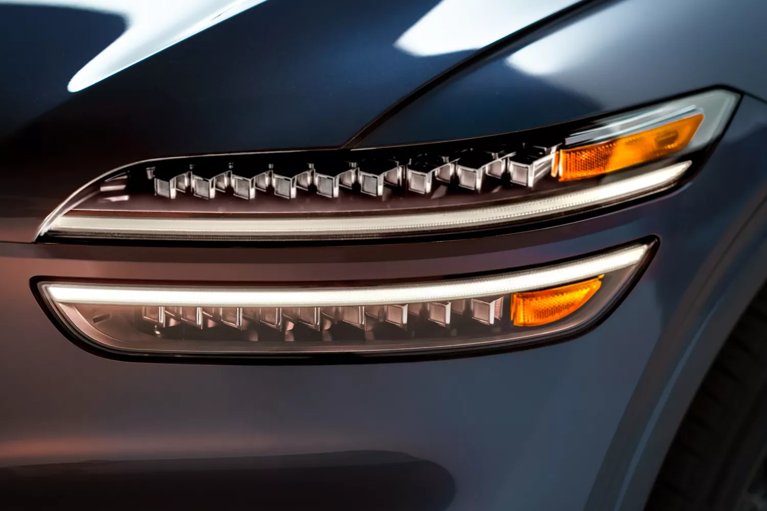 Close-up of front headlight on Genesis GV70