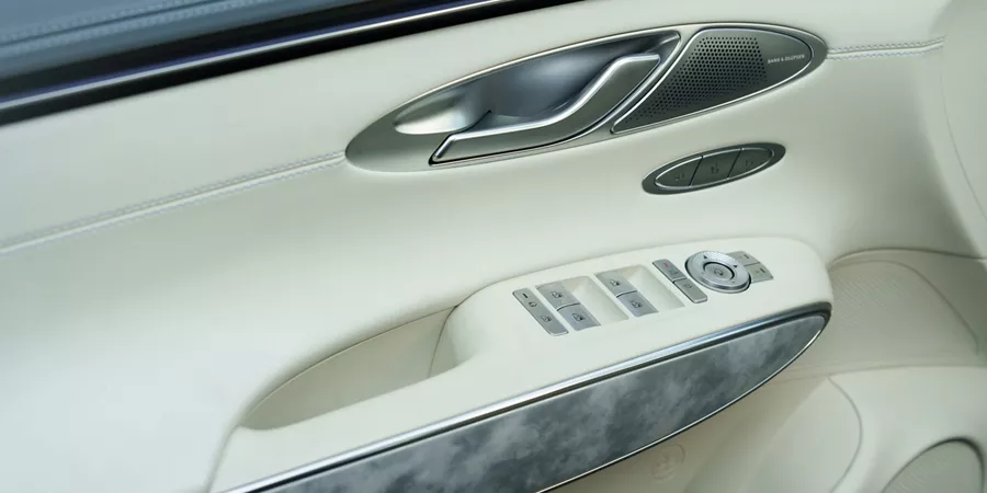 Interior close up of driver side door panel on Genesis Electrified GV70