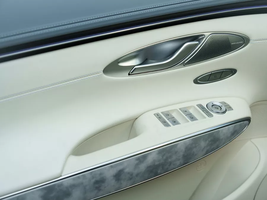 Interior close up of driver side door panel on Genesis Electrified GV70