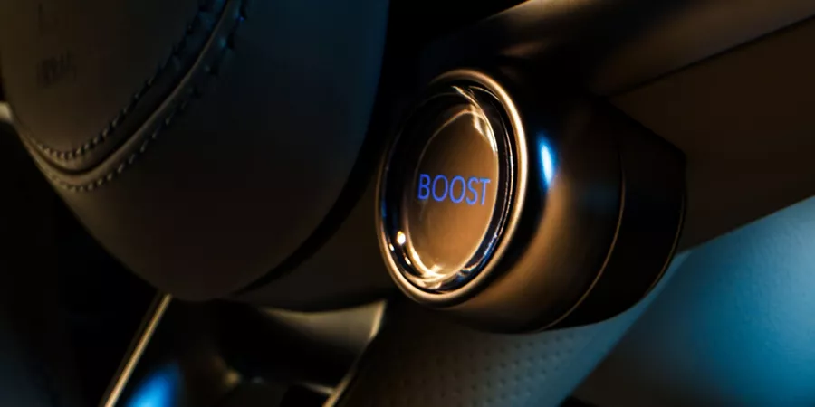 Close up of Boost Mode button on interior of Genesis Electrified GV70