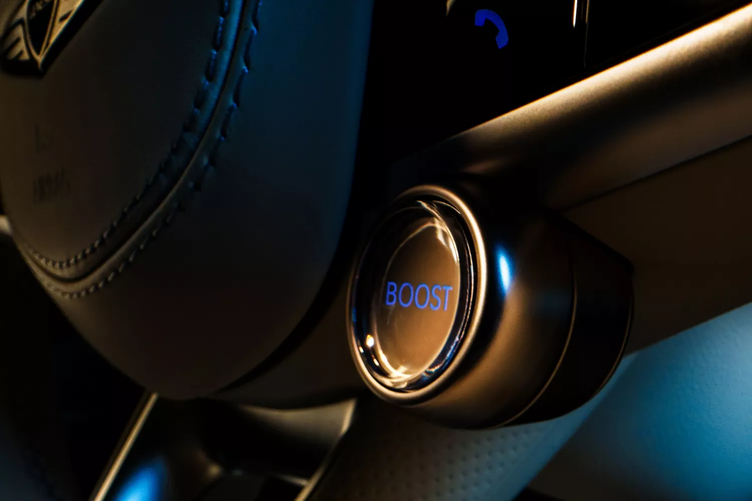 Close up of Boost Mode button on interior of Genesis Electrified GV70