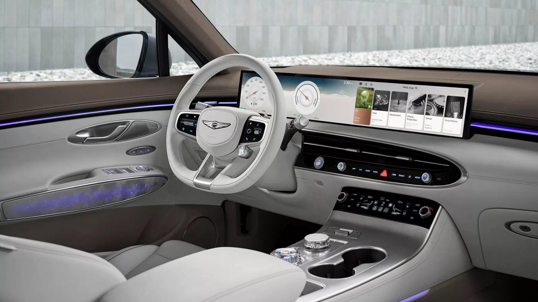 Interior passenger side POV of steering wheel, front dash & front seats in Genesis Electrified GV70