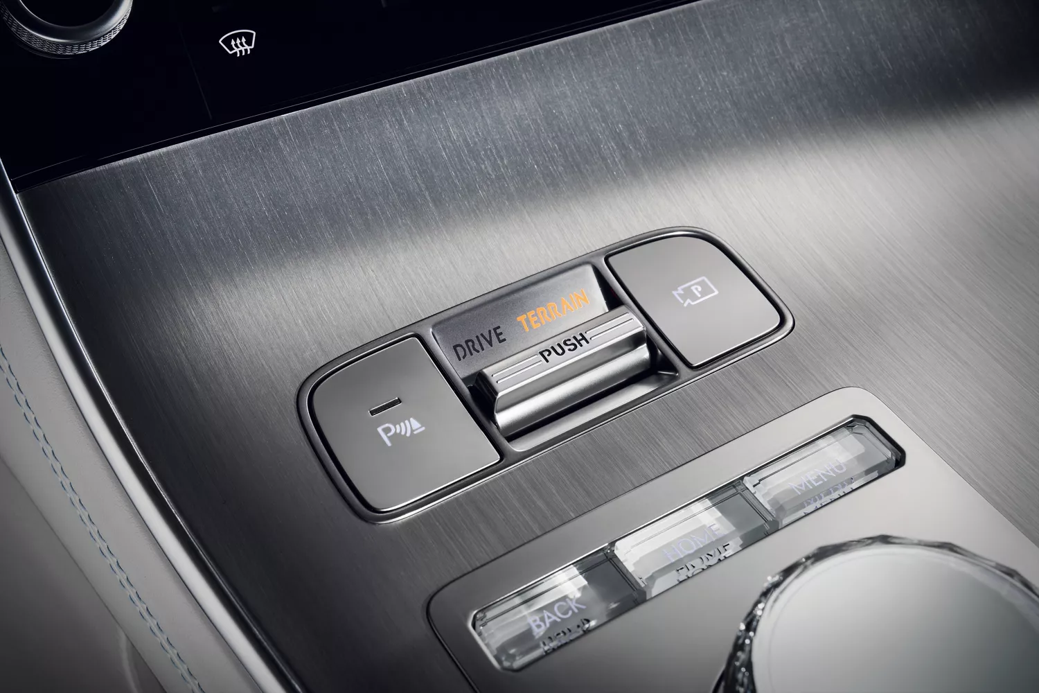 Close up of the performance tabs on the interior center console of Genesis Electrified GV70