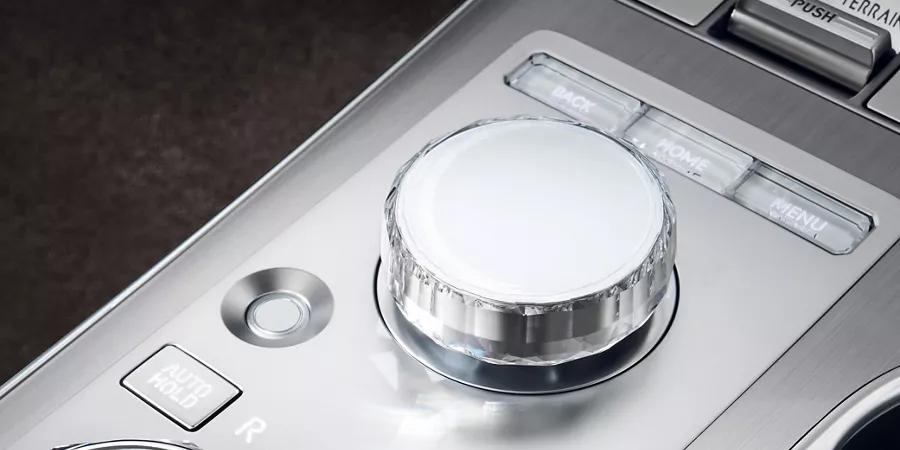 Interior closeup of shift-by-wire wheel on center console inside Genesis Electrified GV70