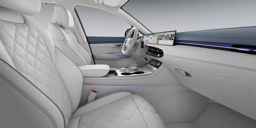 Interior passenger side POV of the driver seat in the Genesis Electrified GV70