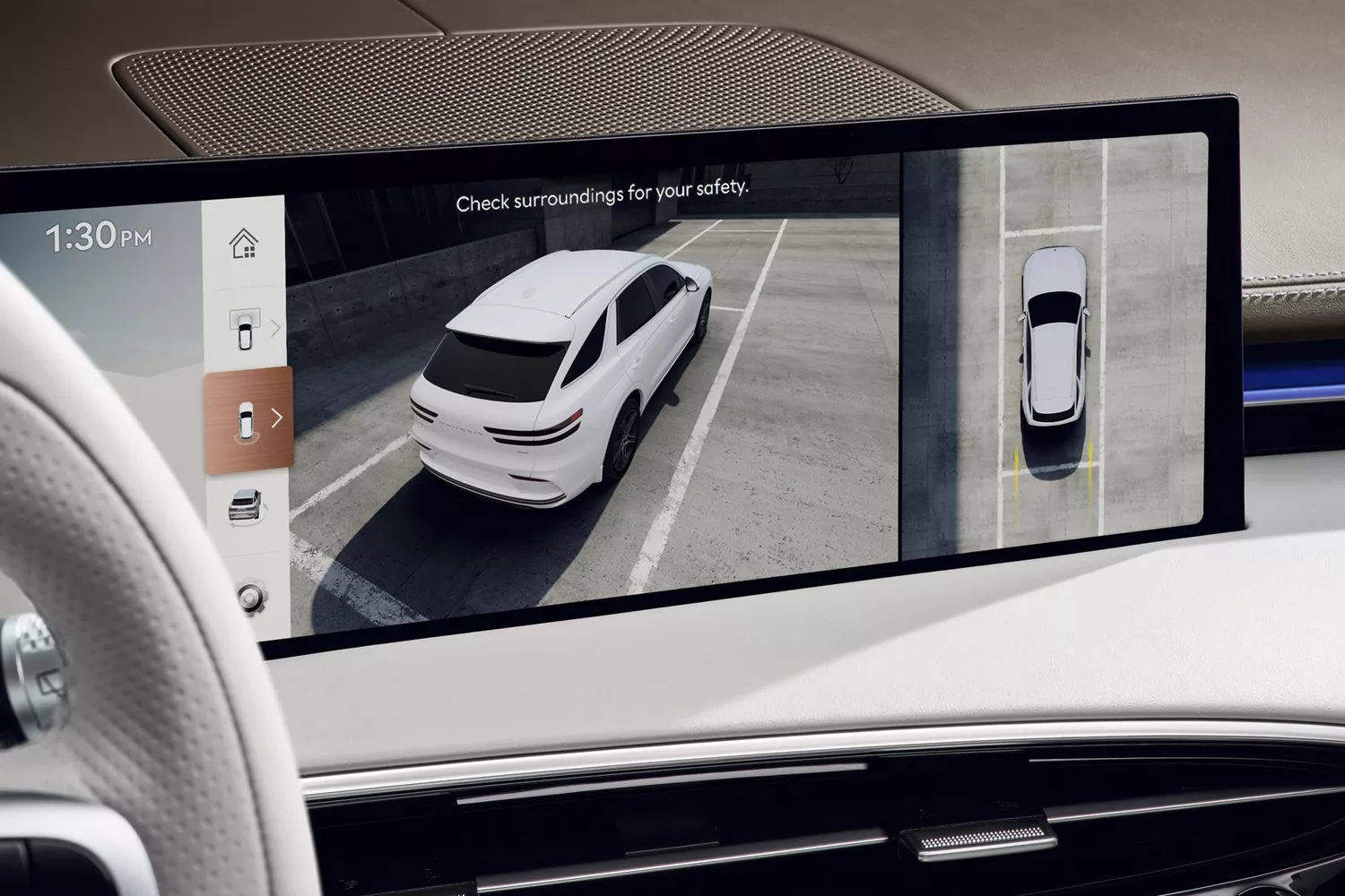 Interior close-up of top and rear camera views on OLED display inside Genesis Electrified GV70