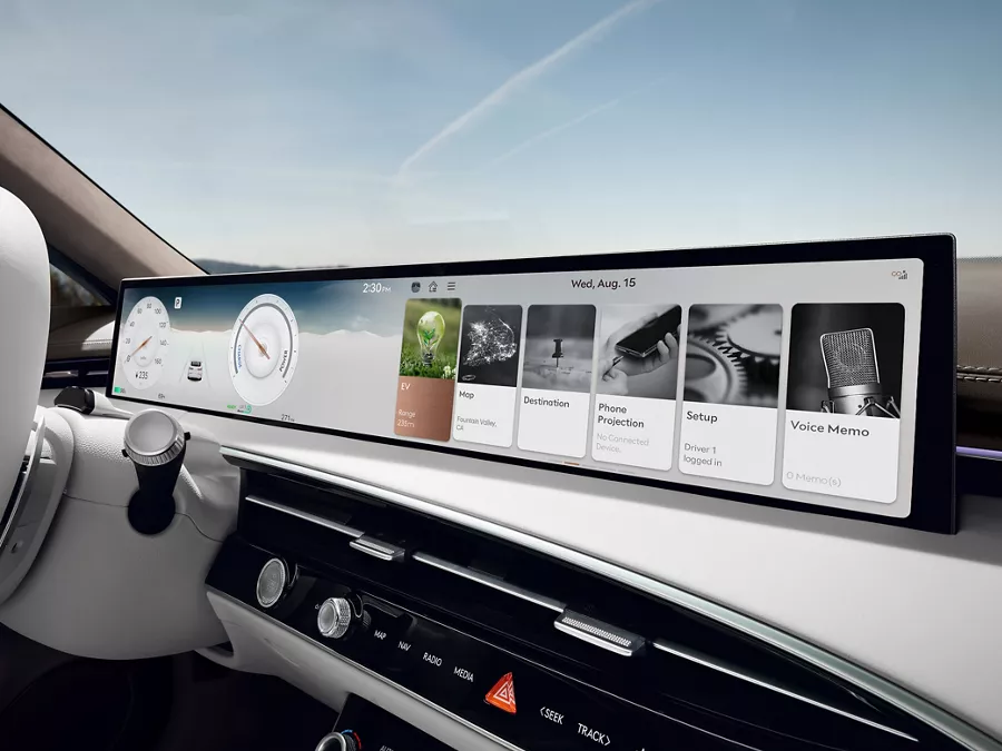 Interior closeup of 27-inch integrated OLED infotainment screen inside Genesis Electrified GV70