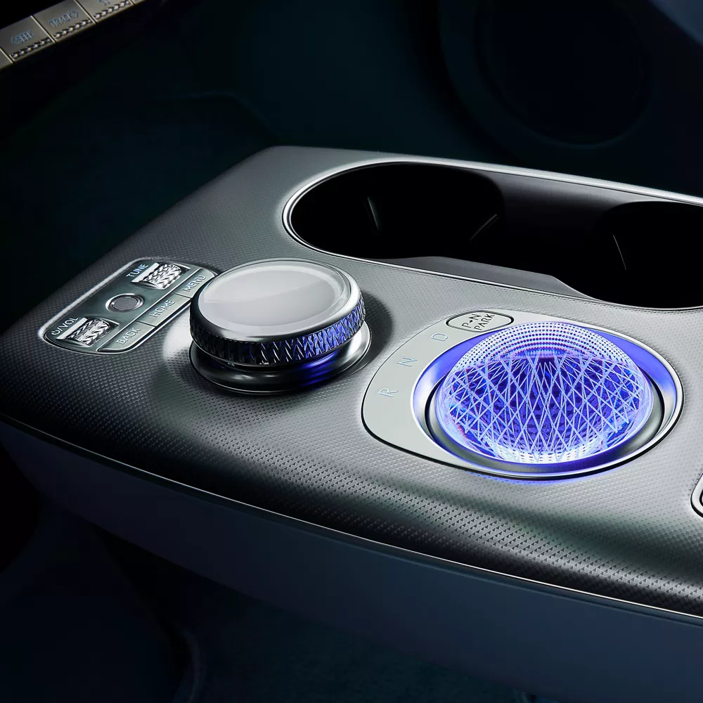 Interior close up of 2026 Genesis GV60 center console showcasing crystal sphere