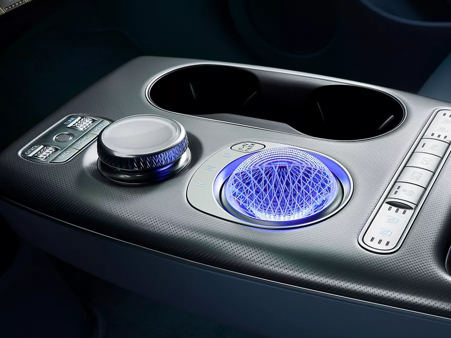 Interior close up of 2026 Genesis GV60 center console showcasing crystal sphere