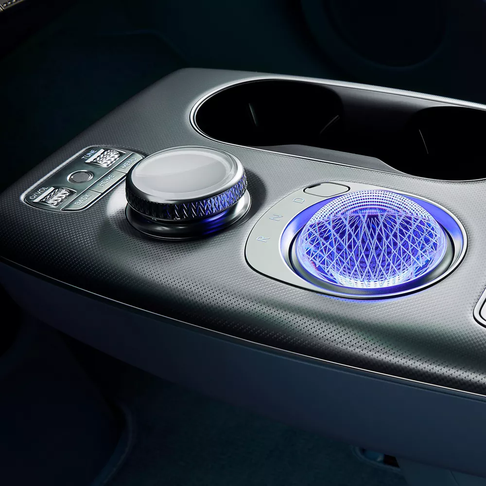 Interior close up of 2026 Genesis GV60 center console showcasing crystal sphere