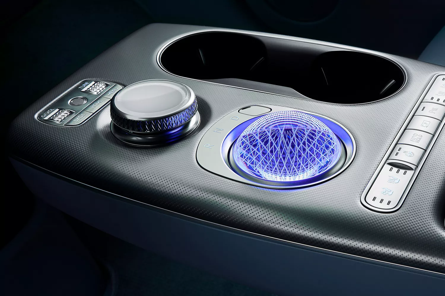 Interior close up of 2026 Genesis GV60 center console showcasing crystal sphere