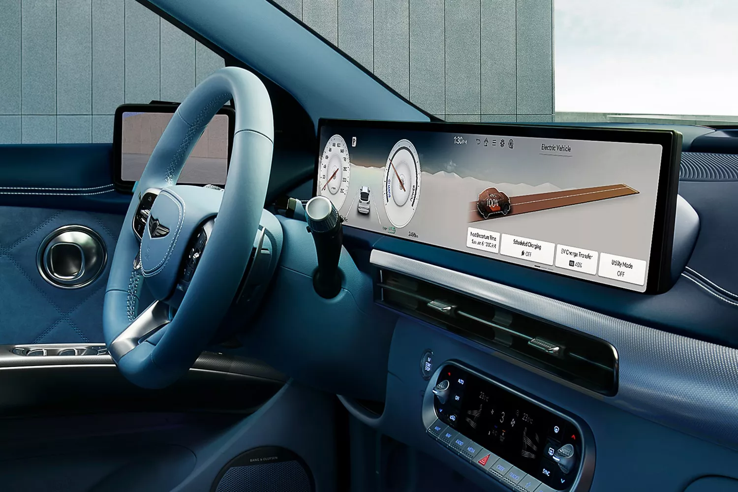 Interior close up of 2026 Genesis GV60 steering wheel and digital dash board