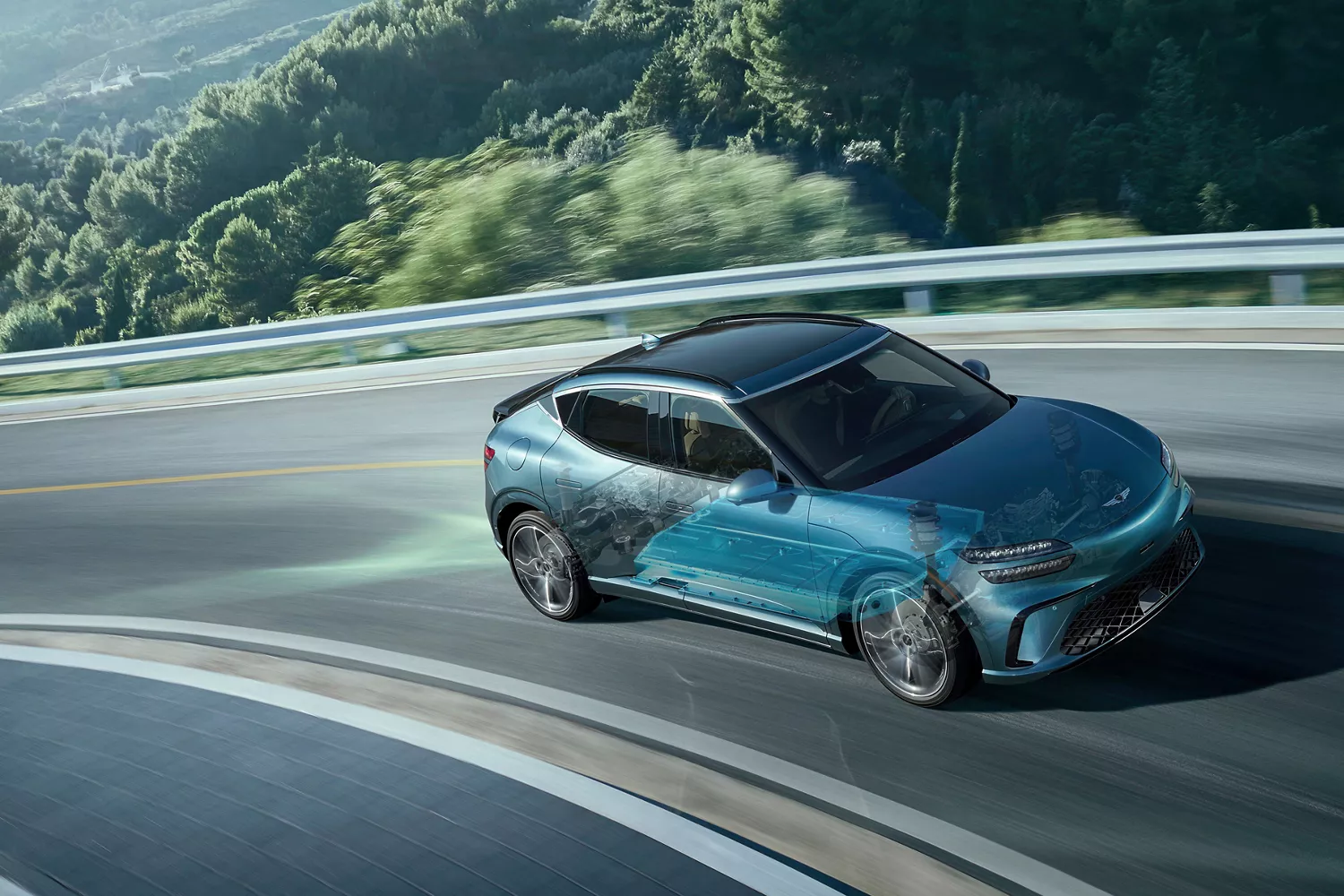 2026 Genesis GV60 on mountain road, with computer generated cross section of suspension system
